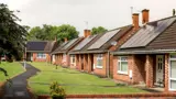 Street view of bungalows with solar panels