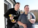 Pictured: Kieran Carlisle (Maintenance Operative) and John Waller (Livin tenant)