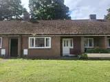 [front view of bungalow at The Park] 