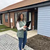 Stock Condition Surveyor inspecting a bungalow