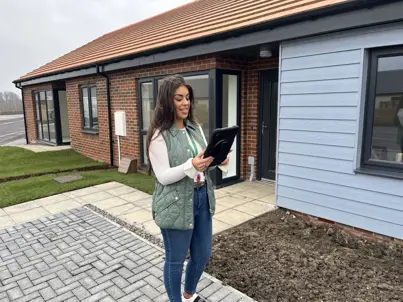Stock Condition Surveyor inspecting a bungalow